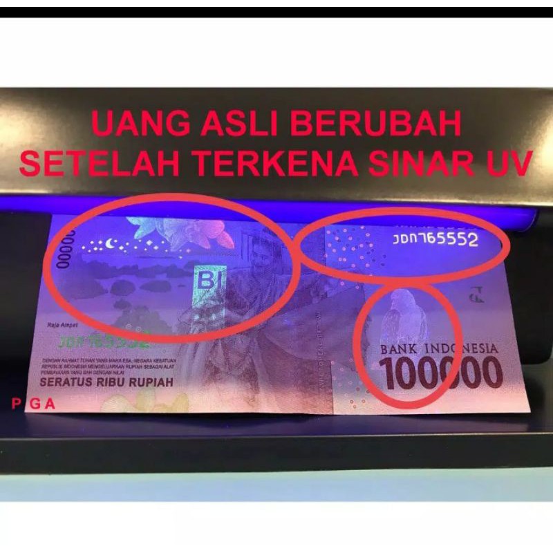 mesin pendeteksi  uang palsu dan asli