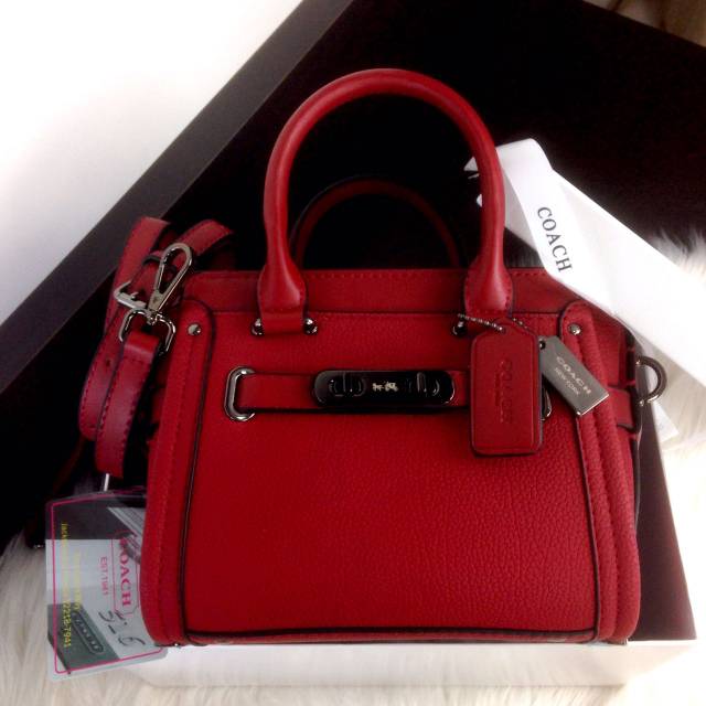 868 coach swagger pebble leather mini