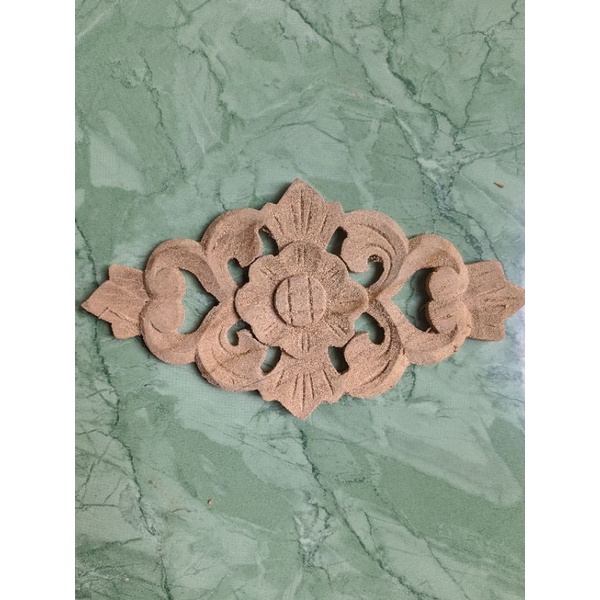 Ornamen ukiran kayu jati