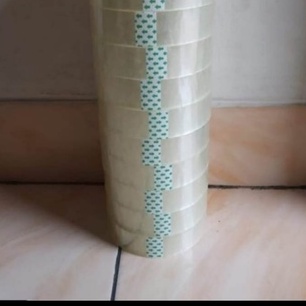 

Lakban Solasi Bening 1 inci isi 12 rol Lem Plastik Pelekat