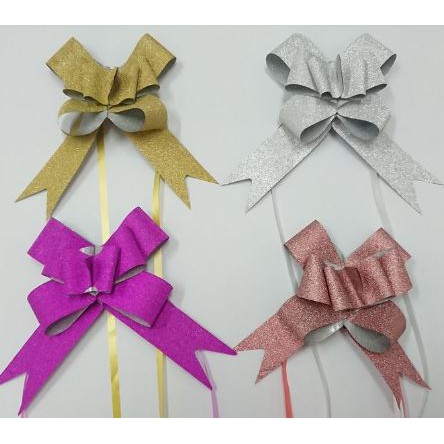 

Pita Tarik Renda 32mm Serut Besar Hiasan Parcel Kado Souvenir Serut Pull Ribbon/Pita Glitter 32 mm