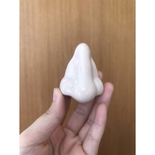 

rautan serutan pinsil bentuk hidung