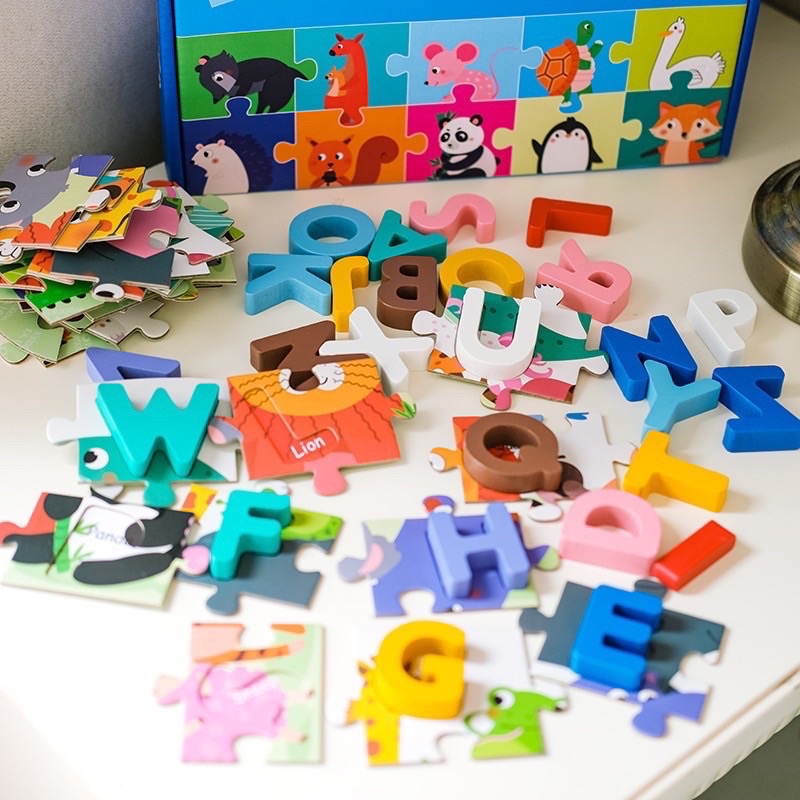 number alphabeth puzzle with wooden pieces