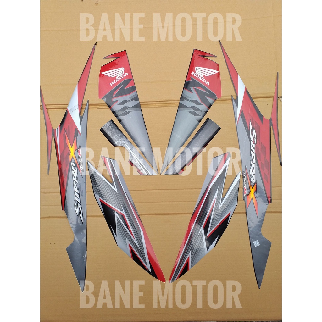 Honda Supra X 125-  stiker body Supra X 125 hitam merah - striping Supra X 125