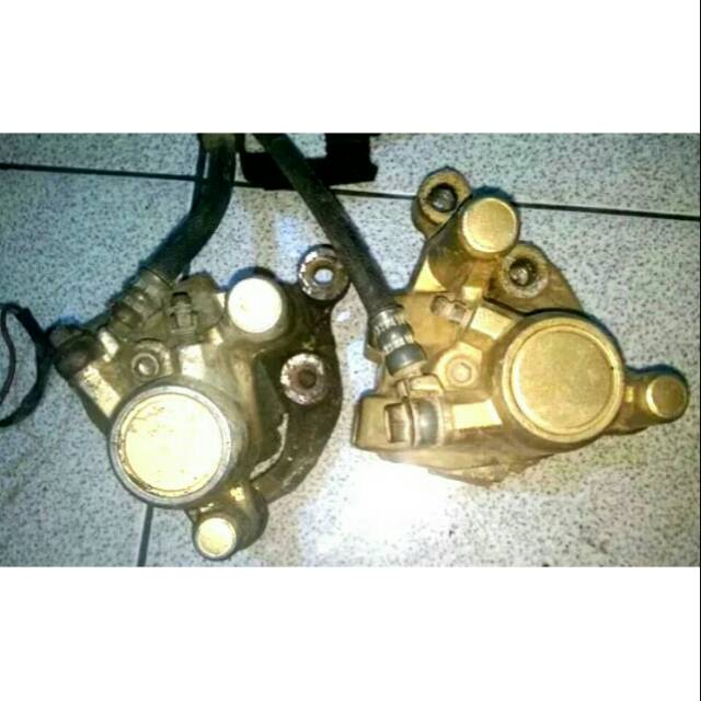 Kaliper satu 1 dan dua 2 Piston RX King Original Copotan