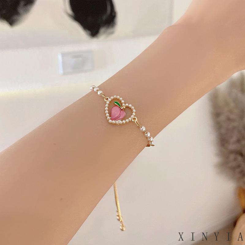 【Bayar di tempat】Gelang Tangan Rantai Wanita Desain Hati Hollow Hias Mutiara Warna Pink Peach Gaya Korea