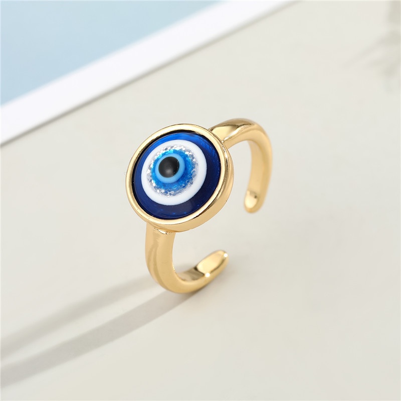 Cincin Model Terbuka Desain Mata Warna Emas Biru Putih Bahan Resin Untuk Pria Dan Wanita