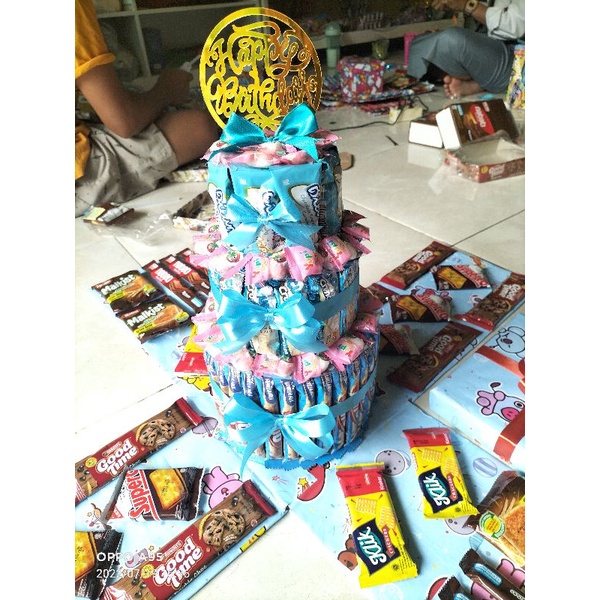 

Box surprise plus menara Snack/plus uang roll