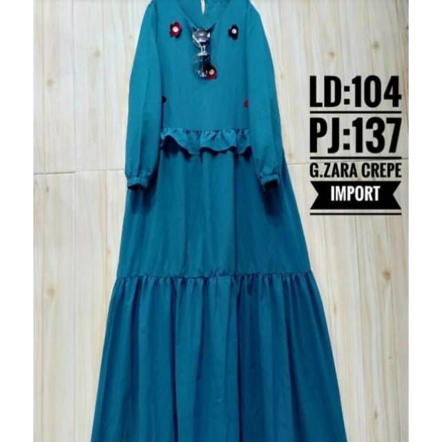 Gamis bunga susun