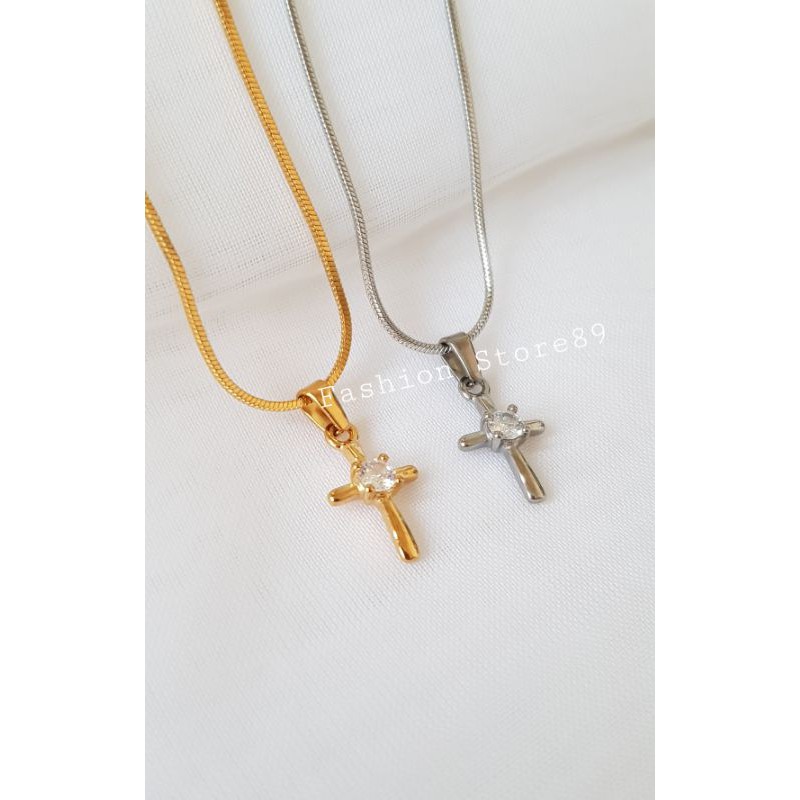 ready kalung Fashion salib titanium ukuran kecil gold white Antikarat import