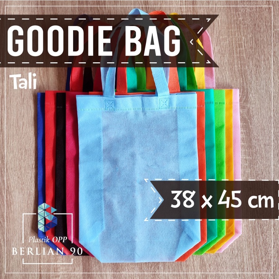 

Goodie Bag 38x45 cm Spundbond Standing Handle Bag Tas Kain Polos