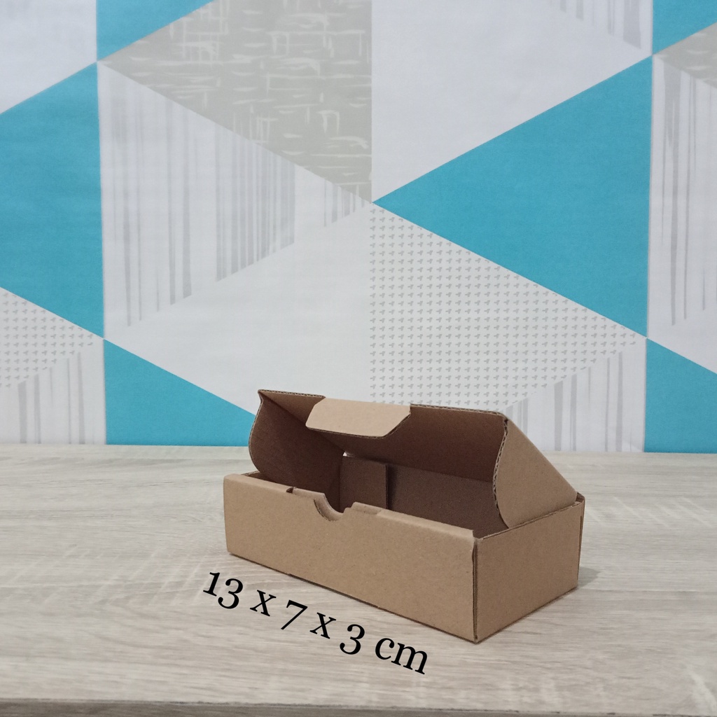 

Kardus 13 x 7 x 3 cm....Die Cut kotak aksesoris dll