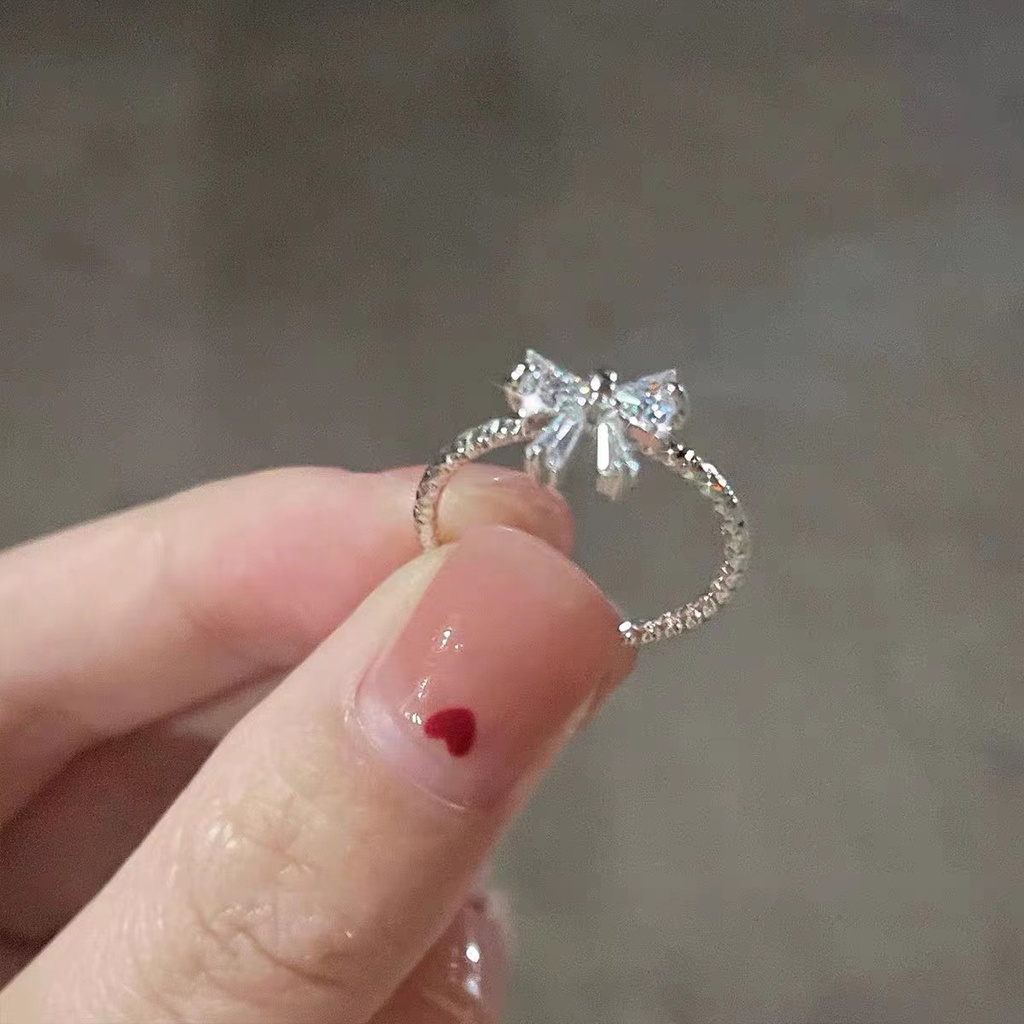 Cincin Model Terbuka Bahan 925 Silver Desain Pita Hias Kristalberlian Imitasi Adjustable Untuk Wanita