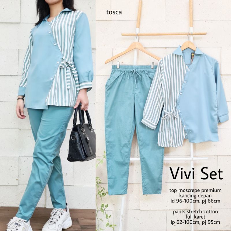 Setelan blus dan celana model terkini