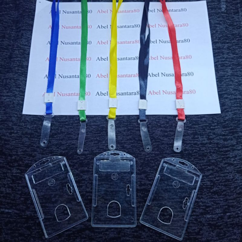 

Paket Casing ID Card Acrylic Bening 1 Sisi+Tali Pengait Karet 1cm