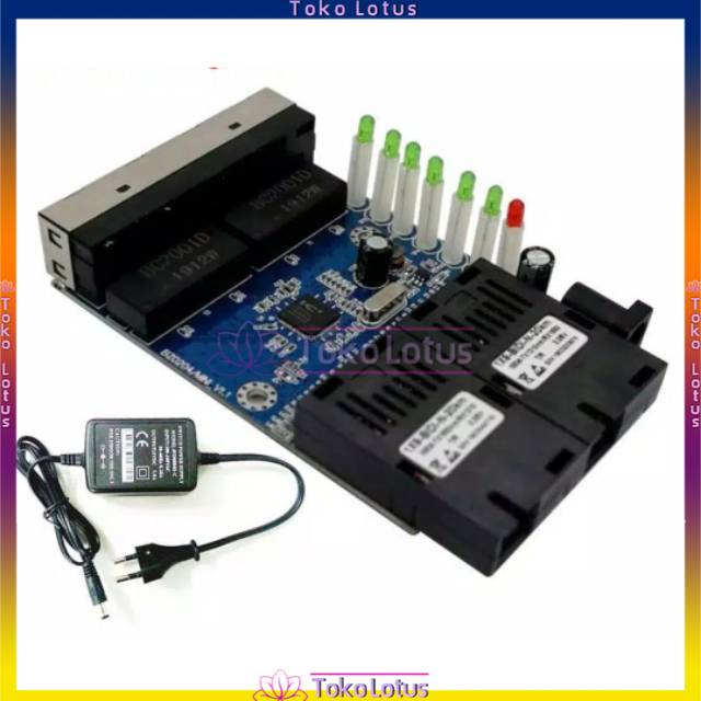 media Converter 2 port fiber optic singel mode A dan B - 4 port rj45-switch Converter dengan adaptor