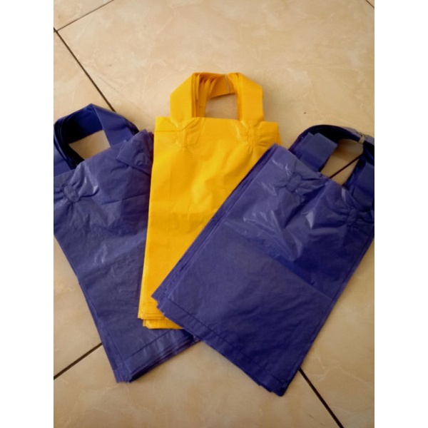 

Kantong plastik shoft handle/ kantong souvenir polos/kantong plastik online shop UK.15x24 tebal 0,4 mm@25 pcz