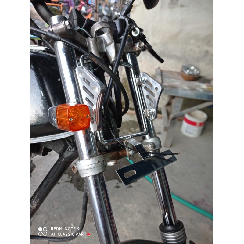 PANGKON LAMPU TRALIS PESEK SEGITIGA CNC KAWASAKI NINJA RR