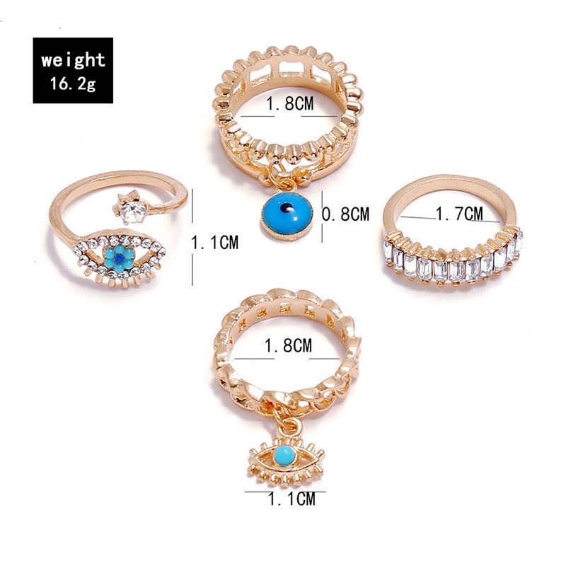 4pcs / Set Cincin Desain Mata Setan Aksen Berlian Model Hollow Gaya Punk Untuk Wanita