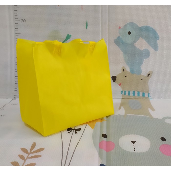 

NEW Tas spunbond kotak 22x22 - HSH 402622 GSM65 "X" - Kuning