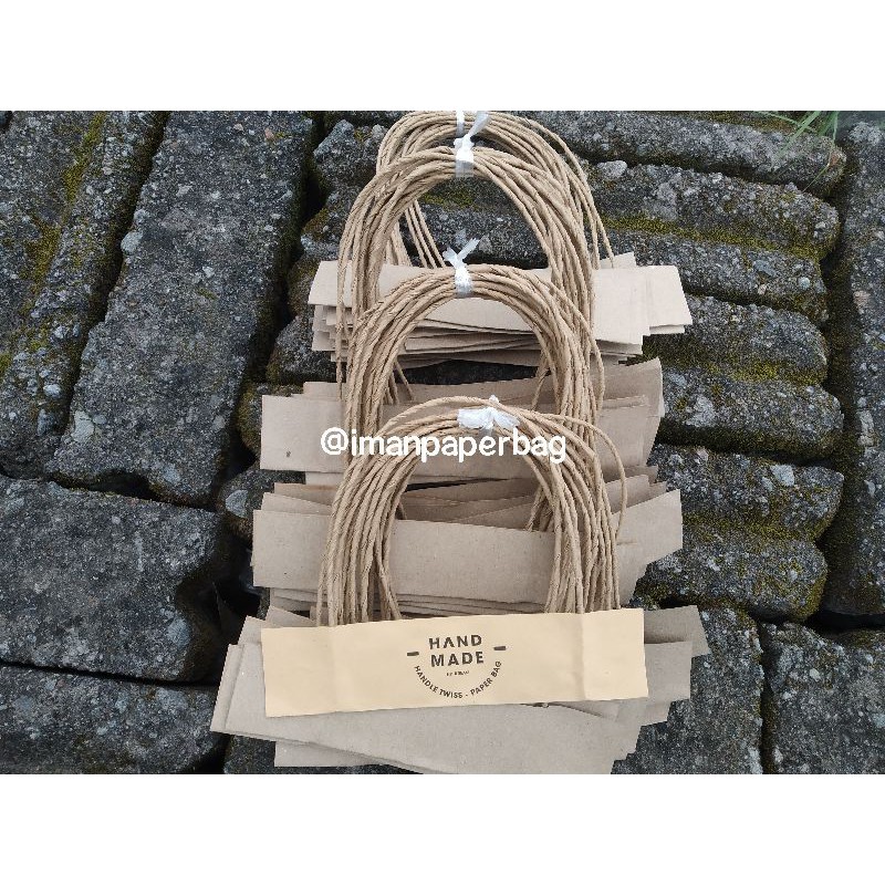 

Tali Paper bag - Handle twiss