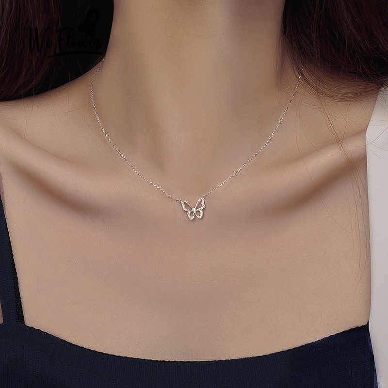 Kalung Choker Rantai Desain Kupu-Kupu Hollow Aksen Kristal Gaya Korea Untuk Wanita