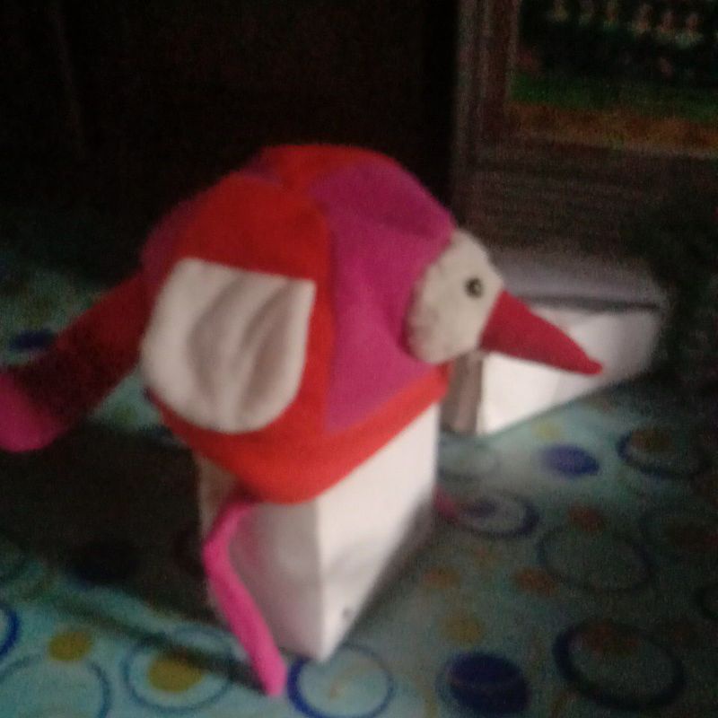 topi anak boneka