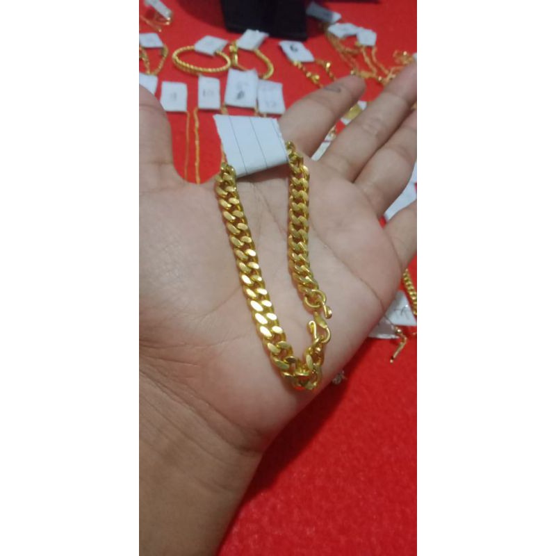 gelang berbahan dasar koin uang 1991