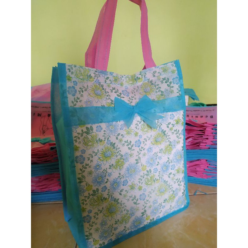 

tas ukuran balen uk.30x20x10 motif belakang sablon