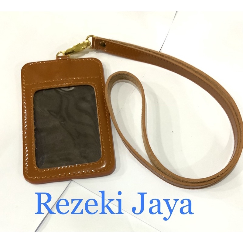 

NAME TAG ID CARD TEMPAT KARTU ID CARD TALI COKLAT GLOSSY 4 SLOT KULIT