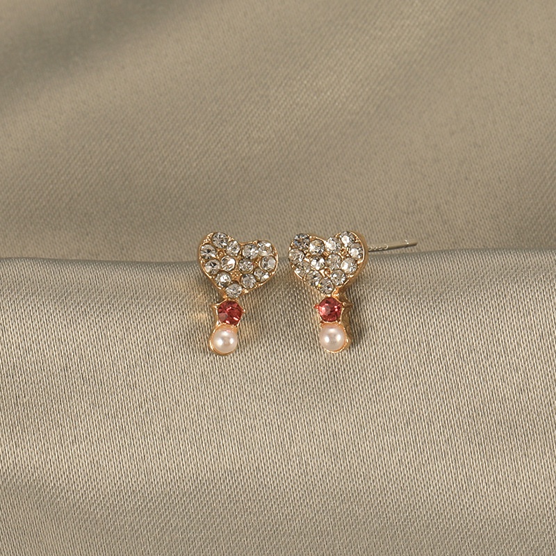 Sterling silver jarum jantung pearl stud anting-anting wanita elegan Korea pribadi mini anting-antin