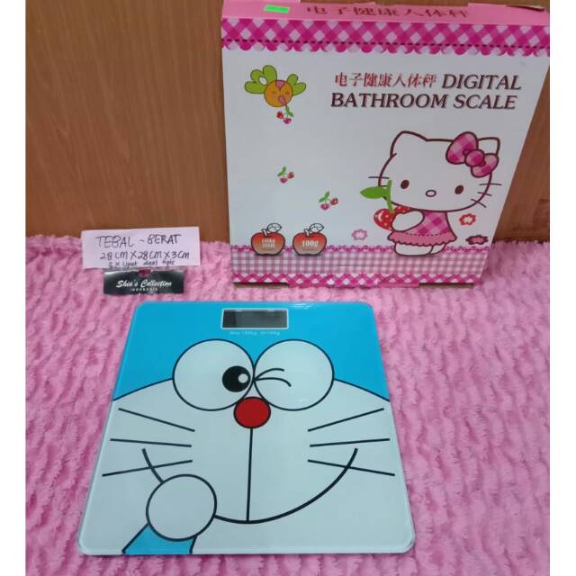 

Timbangan badan tebal kuno doraemon