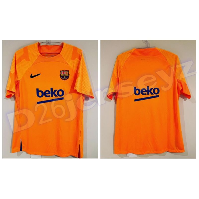 Jersey BarcaA_ Training Prematch Orange 2022 OFFICIAL