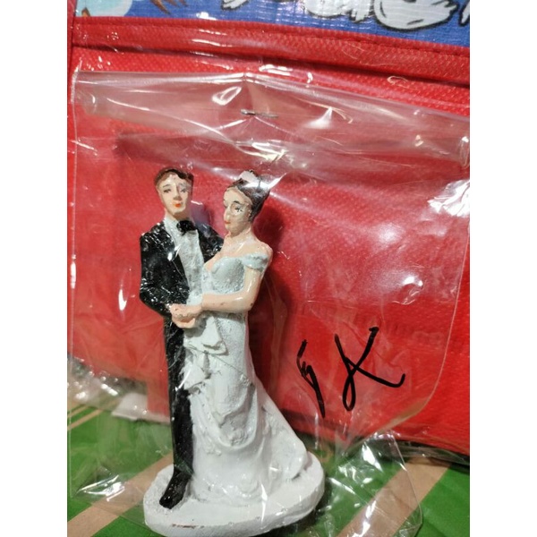 

patung pengantin kecil