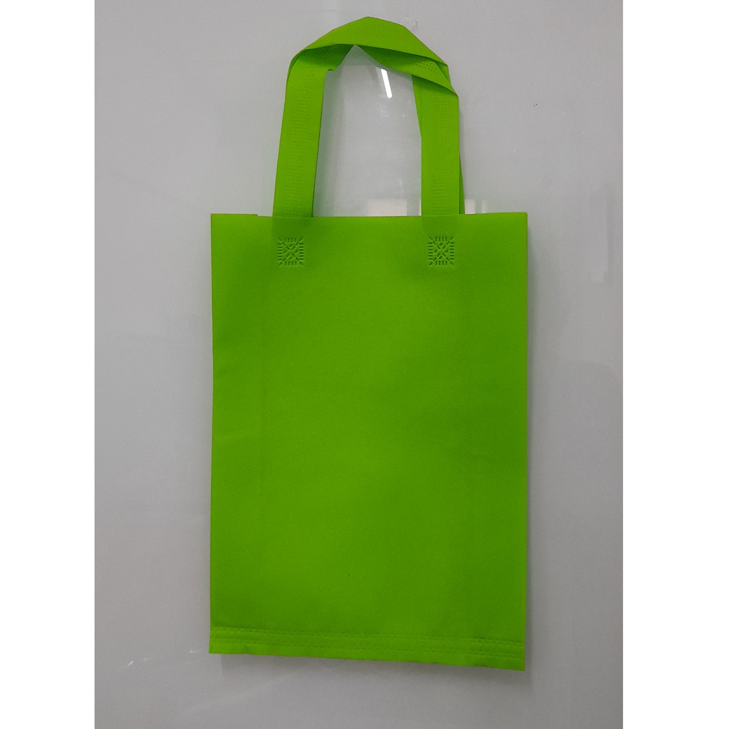 

(Lusin) Tas Press Spunbound Tali Goodie Bag Tas Belanja Warna Kuning 25 cm x 35 cm