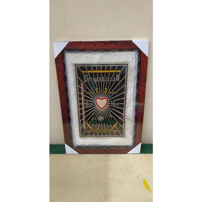 logo psht kulit 50x70 + pigura / pajangan psht / pigura psht / hiasan dinding psht 50x70 ukir