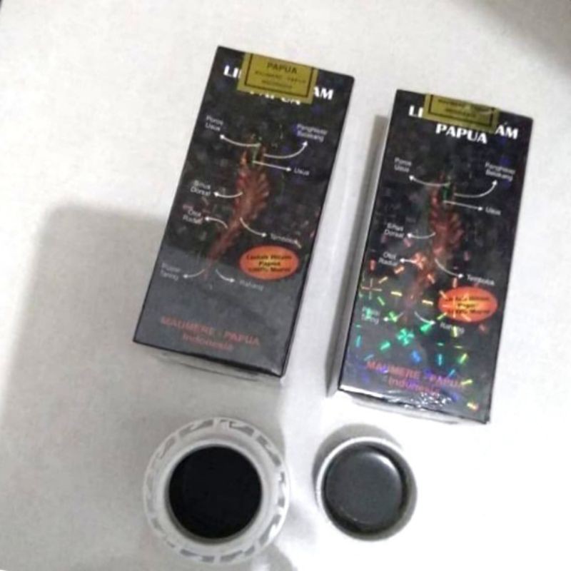 lintah hitam Papua segel gold asli