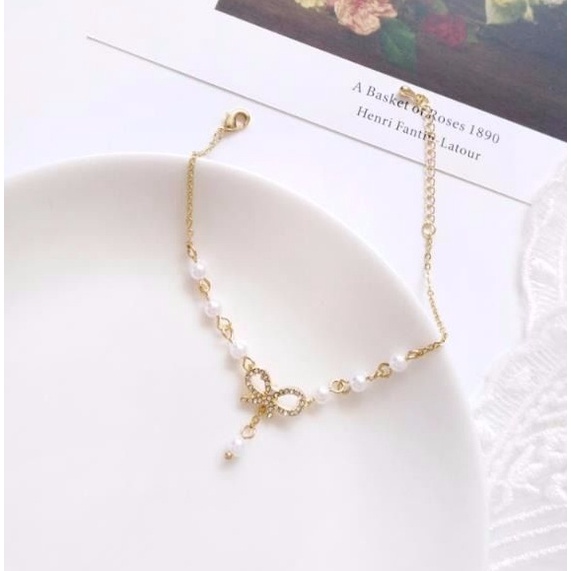 HBS 041 Gelang Mutiara Cinta Berbentuk Pita Gelang Wanita Keren  041 - GL