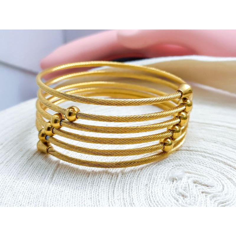 gelang titanium warna emas model ulir orisinal