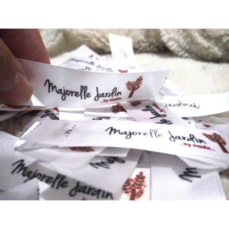 

minimal 200pcs LABEL JAHIT GARANSI ANTI LUNTUR