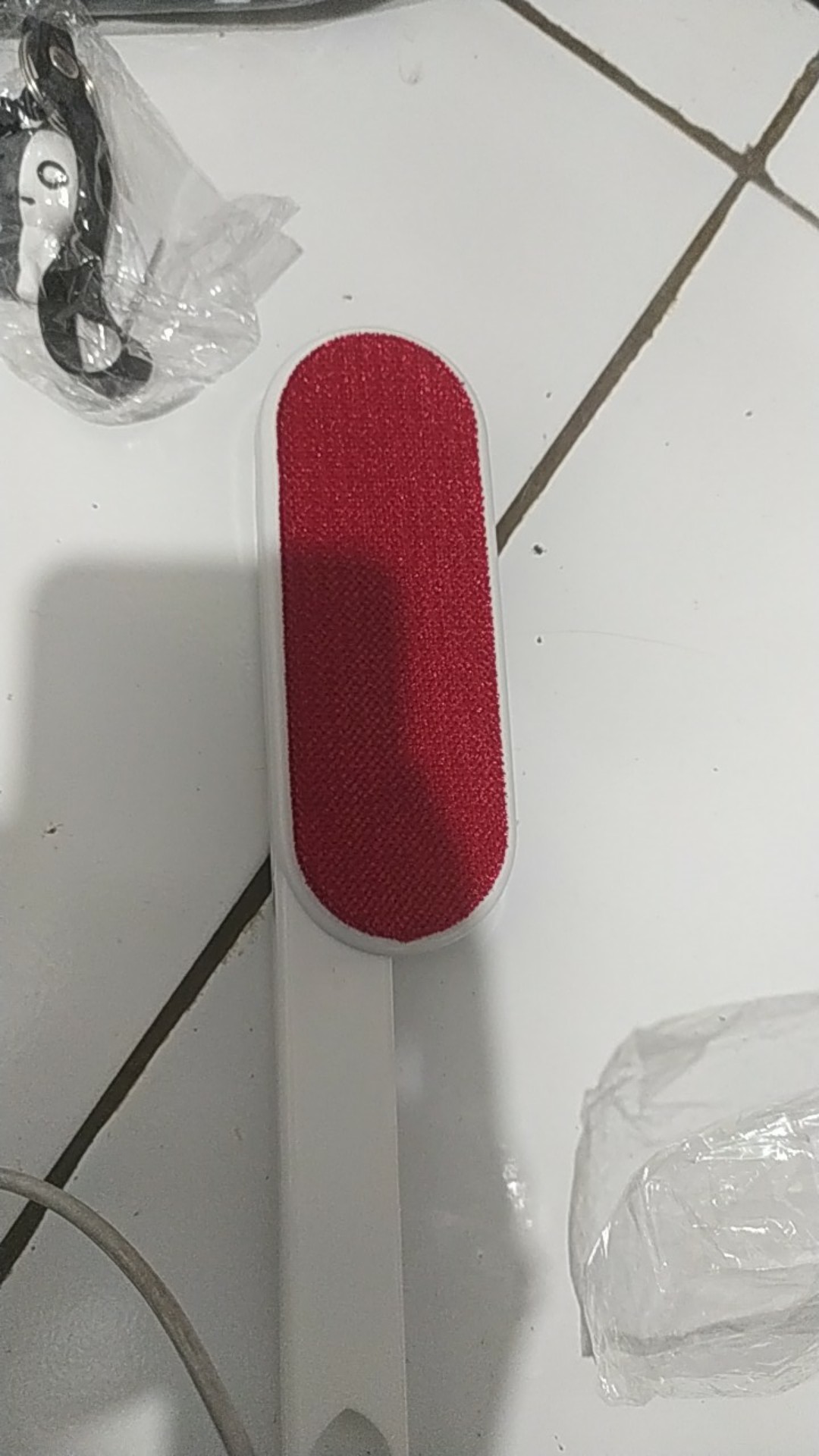 Sikat Pembersih Pakaian Bulu