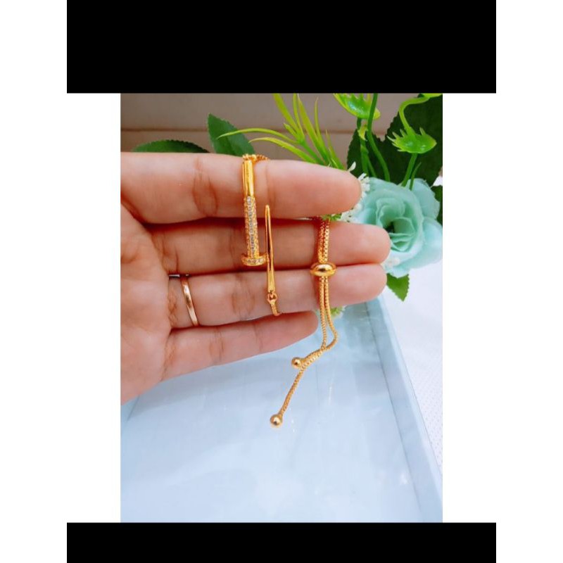 gelang serut titanium paku