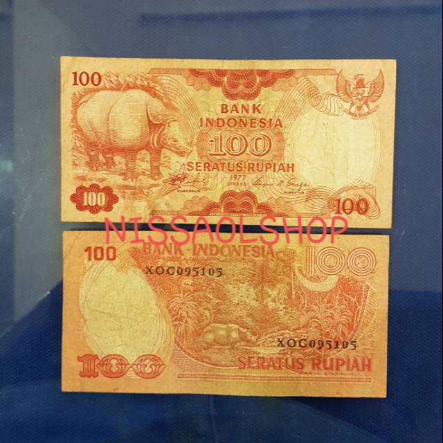 UP119 UANG KUNO 100 RUPIAH BADAK TH 1977/UANGLAMA/UANGKOLEKSI/MAHARNIKAH