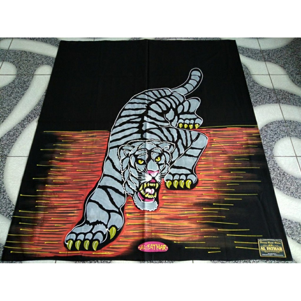 

SARUNG LUKIS ASLI HANDMADE SARUNG KEKINIAN MOTIF MACAN OREN