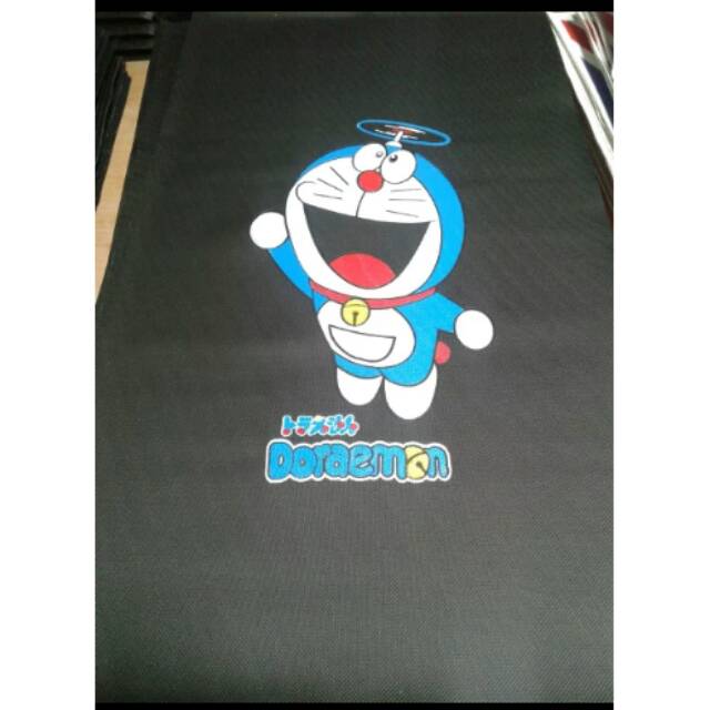Cover kulit jok motor motif doraemon