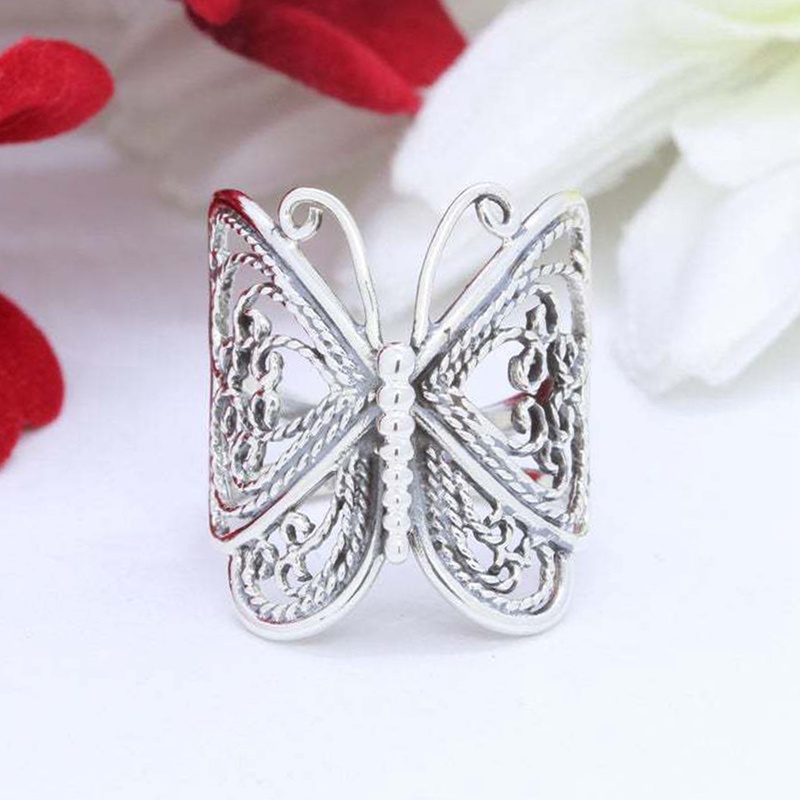 Cincin Desain Kupu-Kupu Hollow Warna Silver Gaya Vintage Punk Untuk Wanita