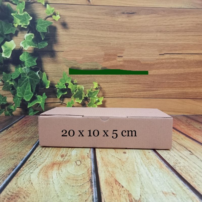 

kardus 20 x 10 x 5cm..Die Cut