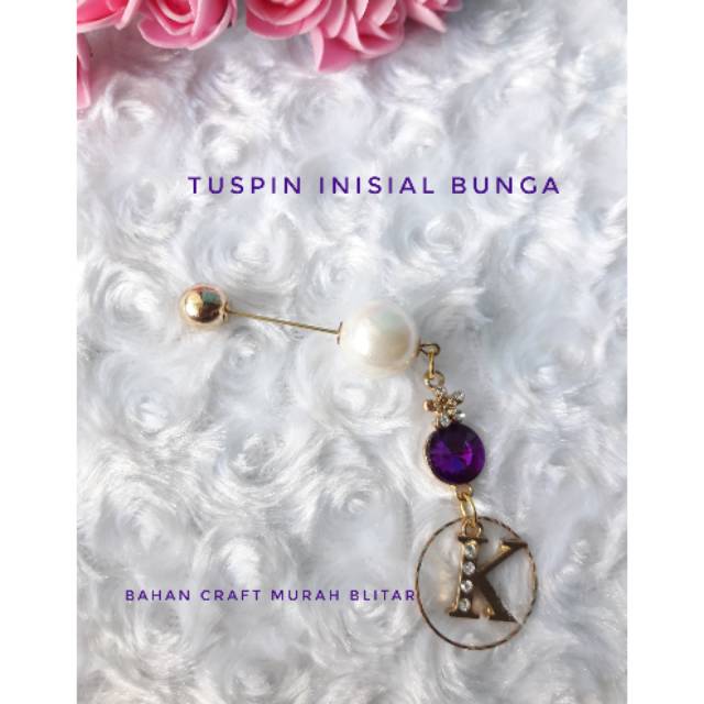 tuspin inisial bunga