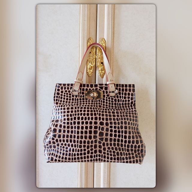 Preloved snake pattern bag