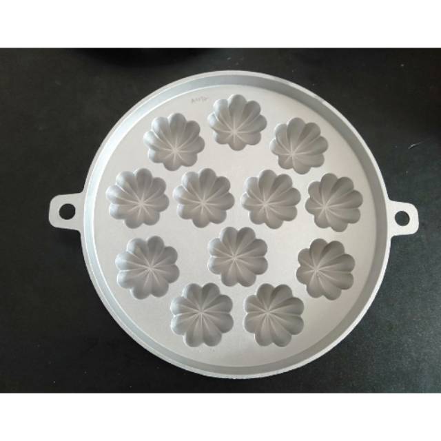 Cetakan bolu Cermai motif mangis